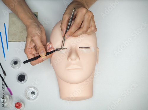 Training eyelash extension on the mannequin. 