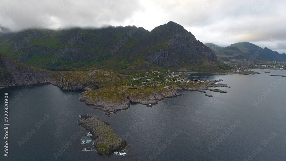 Aerial view of fishing village A in Lofoten islands at midnight sun in Norway