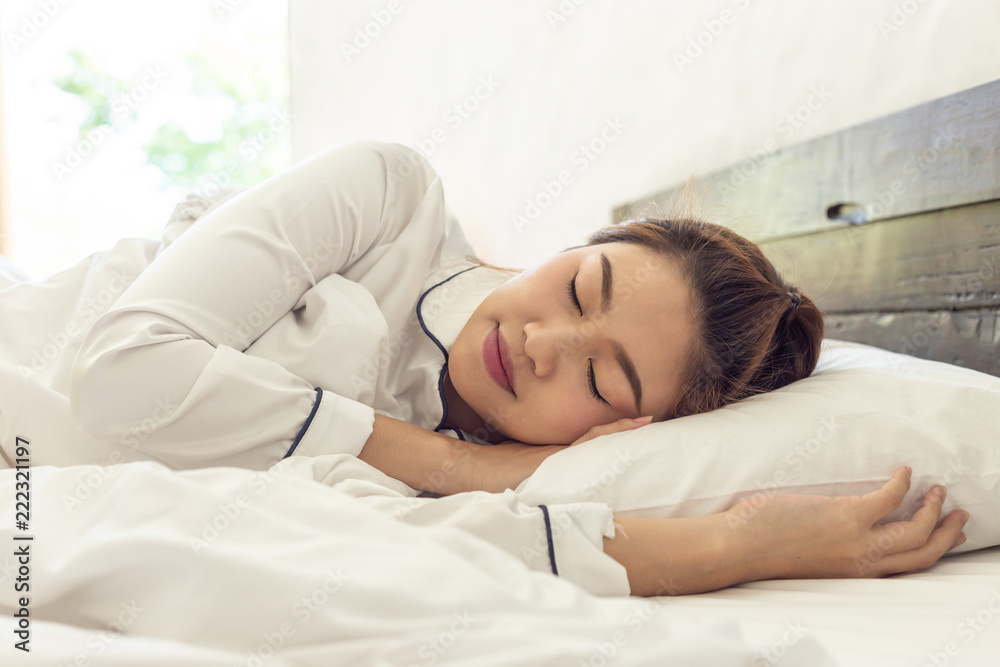 Beautiful Asian woman sleep and sweet dream on bed in bedroom in the morning,Healthcare Concept Beautiful Asian woman sleep and sweet dream on bed in bedroom in the morning,Healthcare Concept