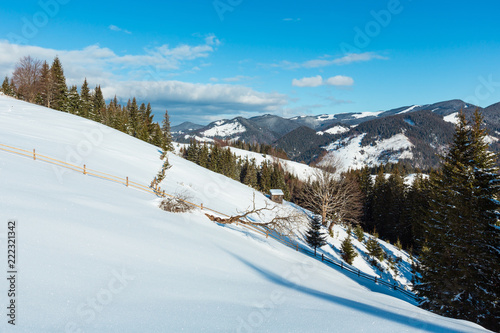 Winter mountain rural snow covered hill slope