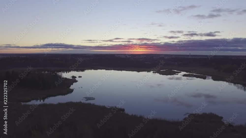 Drone flight over autumn forrest and lake. sunset atmosphere Drone flight over autumn forrest and lake. sunset atmosphere