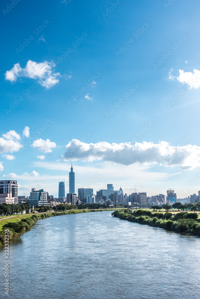 Serenity cityscape with skyscraper and river in Taipei, Taiwan.