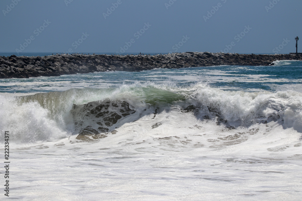 Large wave crashing at The Wedge in Newport Beach Large wave crashing at The Wedge in Newport Beach