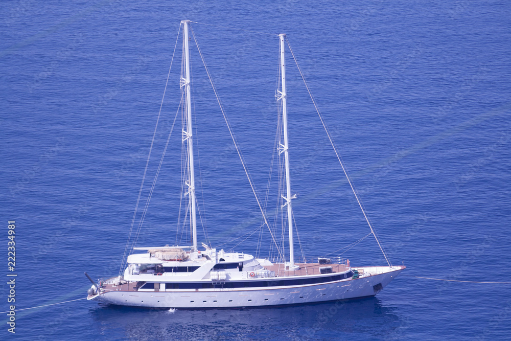 Yacht anchored to shore in Greece, Santorini Island