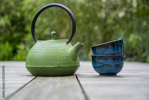 chinese teapot on wooden table