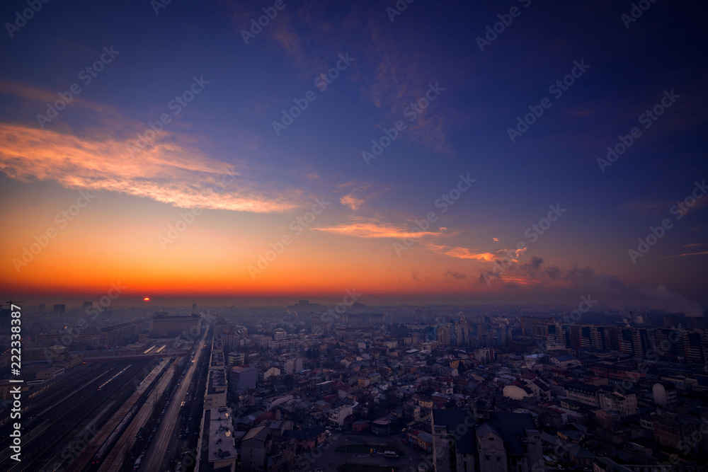 Sunrise scene above the city with city lights and traffic lights and illuminated buildings from Bararab overpass