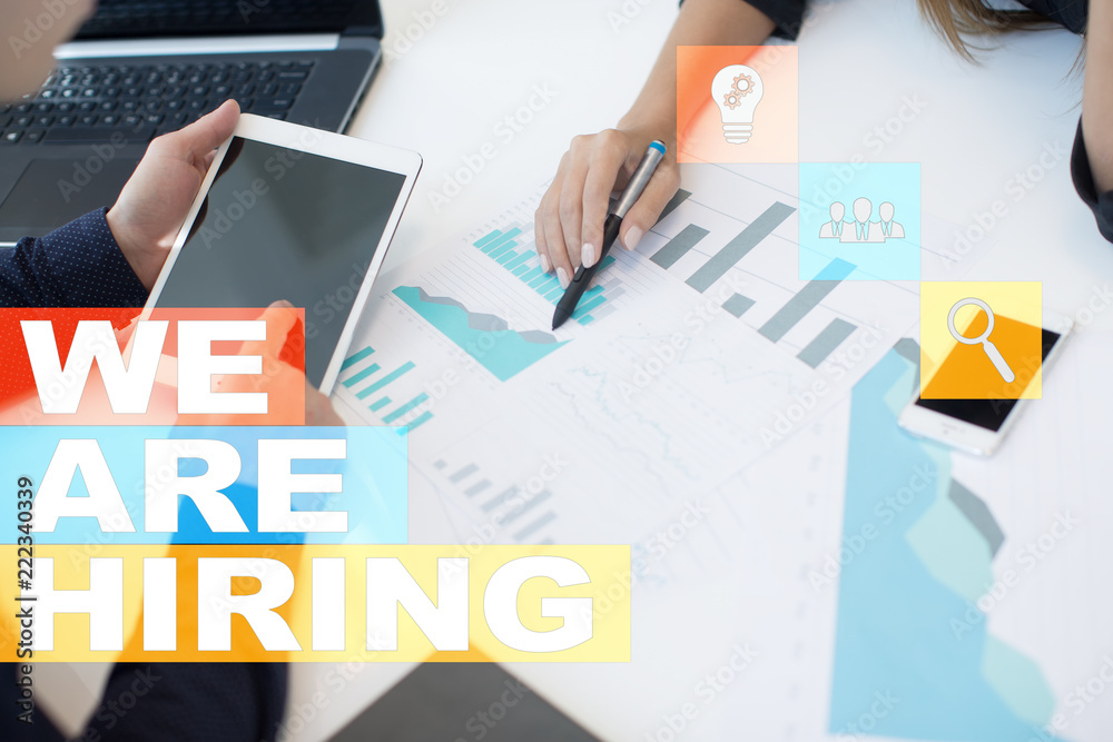 We are hiring text on virtual screen. Recruitment. HR. Human resources management. Business concept. We are hiring text on virtual screen. Recruitment. HR. Human resources management. Business concept.