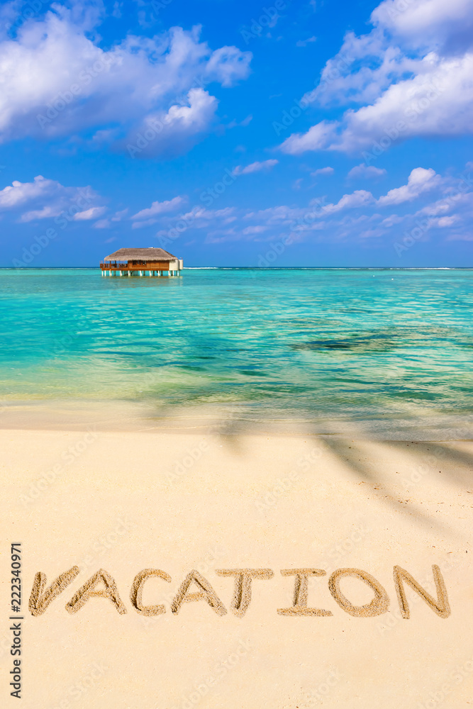 Fototapeta premium Word Vacation on beach