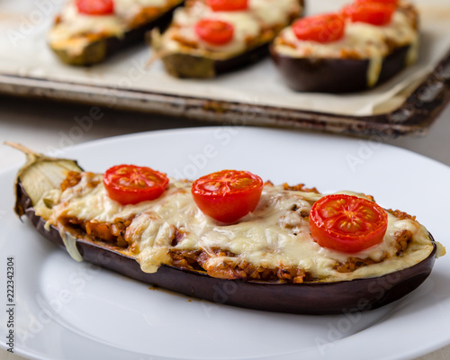 healthy bulgur stuffed eggplant with cherry tomatoes and cheese