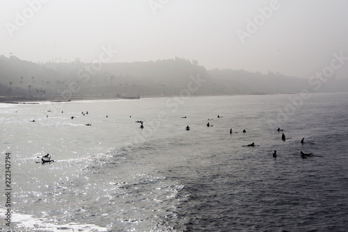 Surfers waiting for the next wave in malibu, California in summer time 
