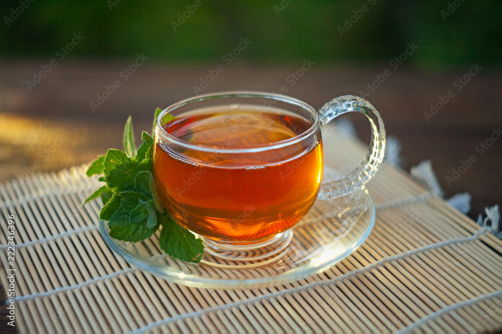 delicious green tea in a beautiful glass bowl on table delicious green tea in a beautiful glass bowl on table
