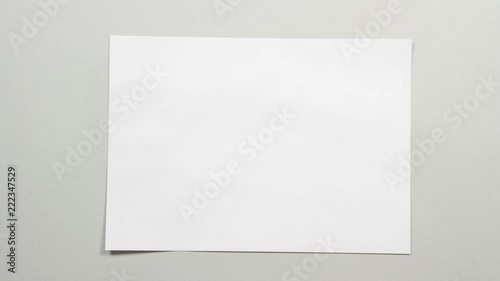 Stop motion animation paper wrinkles making paper ball and disappears. intro, outro, transition.