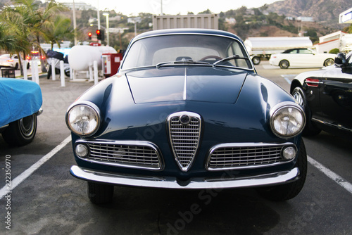 Front view of a classic vintage car in the street © CoolimagesCo
