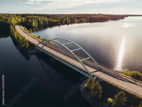 Steel bridge over lake at Suomussalmi Finland photo