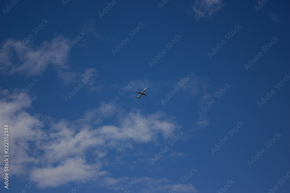 the plane is flying in the sky the plane is flying in the sky