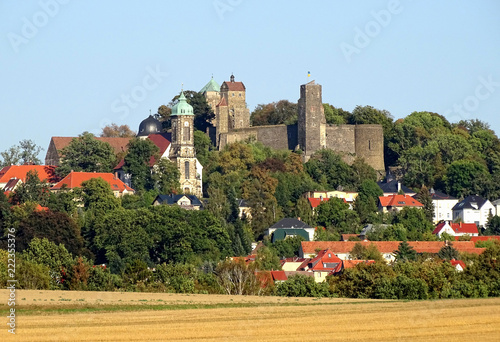 town on a hill with church and castle - Stolpen, Saxony, Germany photo