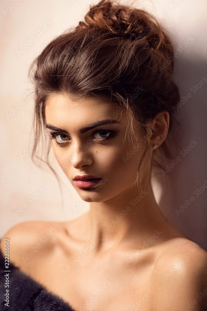 Portrait of beautiful young brunette woman with makeup Portrait of beautiful young brunette woman with makeup