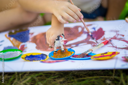 Children draw in summer park. Art concept
