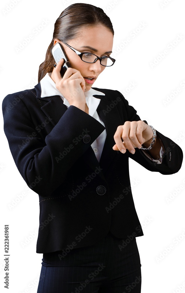 Shocked Businesswoman Talking on Mobile Phone and Checking Time Shocked Businesswoman Talking on Mobile Phone and Checking Time