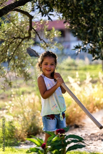 Little Girl gardening at home