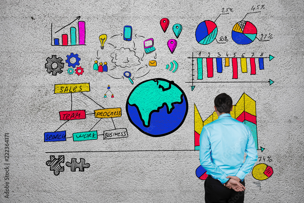 Businessman looking at sketched business strategy Businessman looking at sketched business strategy