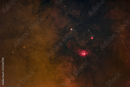 The central part of the Milky Way with the Lagoon Nebula and the Trifid Nebula in the constellation Sagittarius as seen from Mannheim in Germany.
