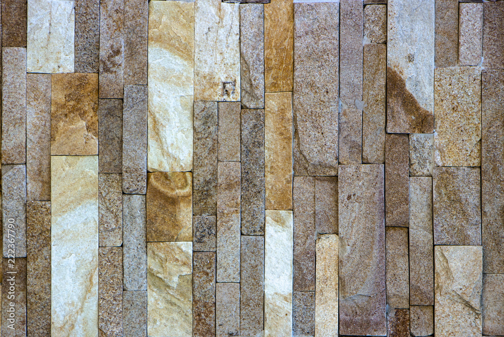 Naklejka premium Orange facing stone, slate, sandstone and travertine marble texture