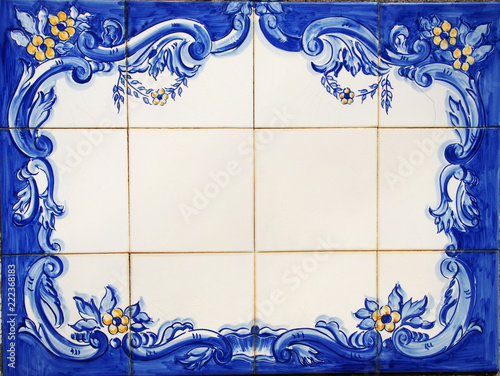 tile plaque in wall at portuguese street photo