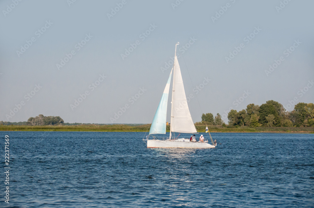 Obraz premium Container ship in export and import business and logistics. Shipping cargo to harbor by crane. Water transport International. Aerial view