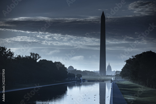 Washington DC Monument and the US Capitol Building across the reflecting pool from the Lincoln Memorial on The National Mall USA