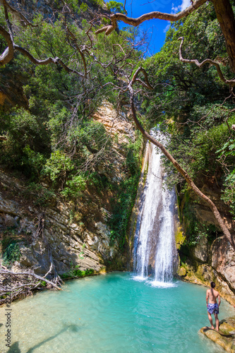 Waterfall in the Neda. The Neda is a river in the western Peloponnese in Greece. Neda is the only river in Greece with a feminine name. It flows into the Gulf of Kyparissia, a bay of the Ionian Sea.