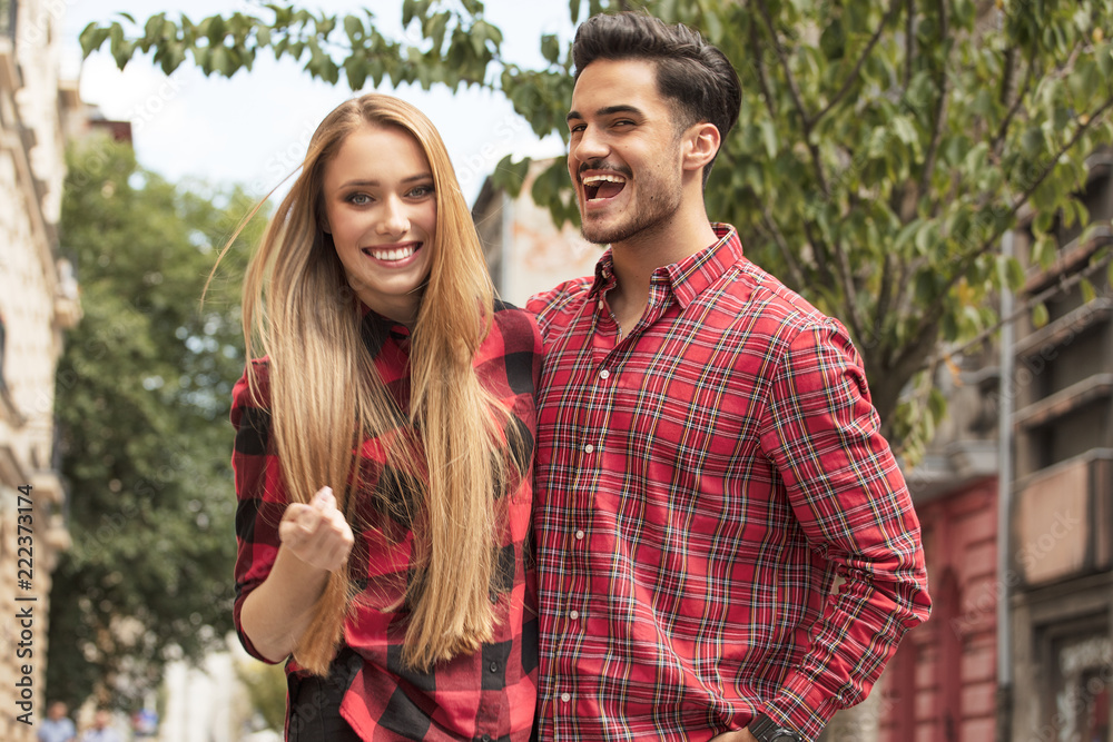 Fototapeta premium Smiling beautiful couple dating outdoors.