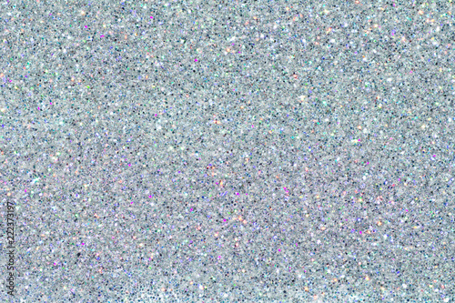 Holographic multicolor chrome texture. Sequins powder. Colored glitter. Shining background