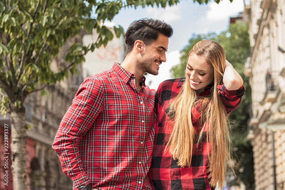 Fototapeta premium Smiling beautiful couple dating outdoors.