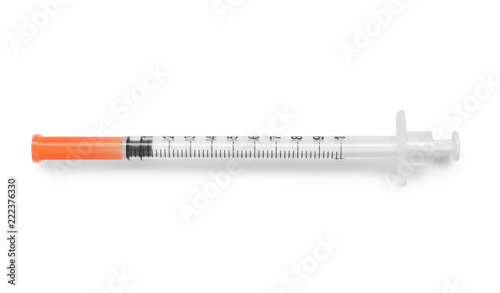 Empty syringe on white background, top view. Medical treatment