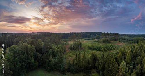 Aerial: Summer sunset over foggy forest © milosz_g