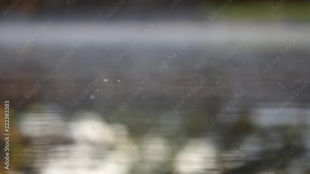 Morning haze over water surface in hot spring Morning haze over water surface in hot spring