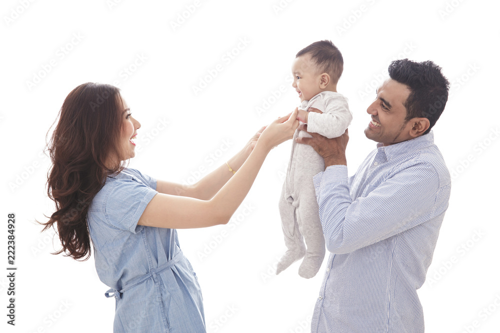 casual happy family playing with their cute son casual happy family playing with their cute son