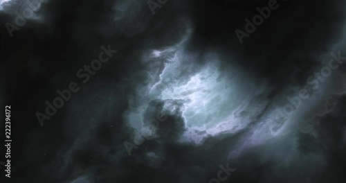 Fly through space nebulae and star field. Glowing clouds and dark dust. Green and blue hue.