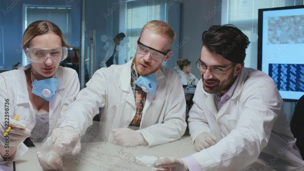 Chemists of research center conduct experiments Chemists of research center conduct experiments