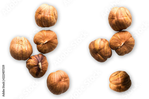 Hazelnuts isolated on white background. Creative concept of health and wellness. Nuts. Top view