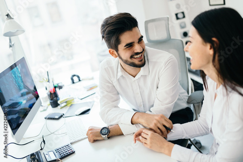 Business people working together on project and brainstorming in office