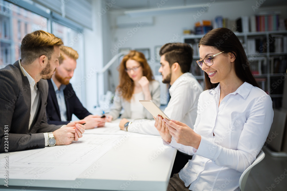 Portrait of attractive business partners using tablet Portrait of attractive business partners using tablet