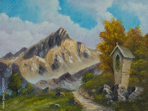 Bildstock neben einem schmalen Weg in den Bergen photo