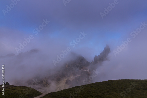 Dramatic clouds at sunset and beautiful light in the Dolomite Alps