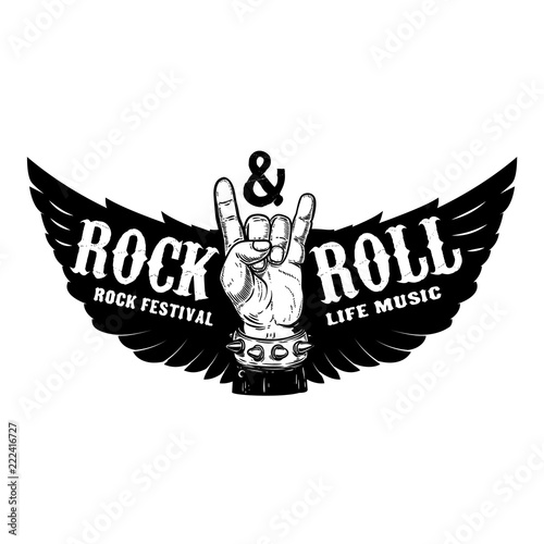Rock festival. Human hand with rock and roll sign on background with wings.  Design element for t-shirt print, poster.