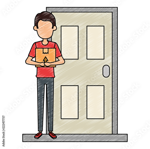 delivery worker lifting box in door