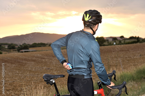 a cyclist who keeps sunglasses in his pocket