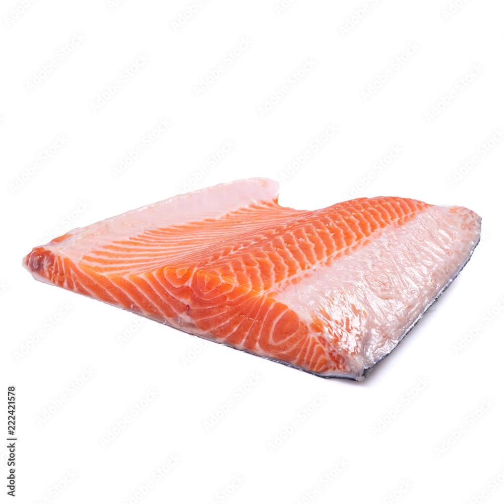Fresh salmon fillet on e white background.