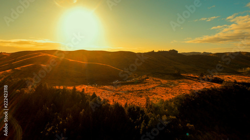 amberley new zealand at sunset over the mountains shot by drone photo